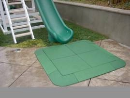 rubber tiles in front of slide